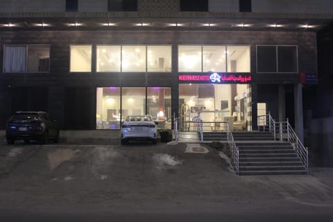 Property building, Facade/entrance, Night, People, group of guests, Parking