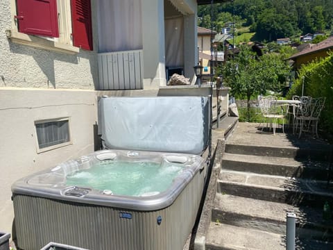 Lake and Mountain View Villa with Whirlpool and Free Parking in Huenibach Villa in Hilterfingen