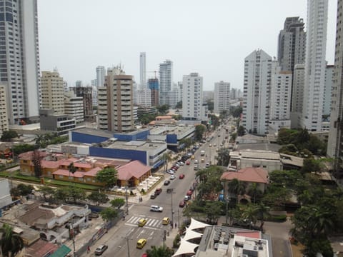 Staff, Balcony/Terrace, City view, Street view, older children, group of guests, Family