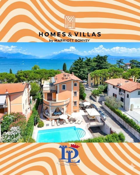 Property building, Property logo or sign, Bird's eye view, Logo/Certificate/Sign, Pool view, Swimming pool, sunbed