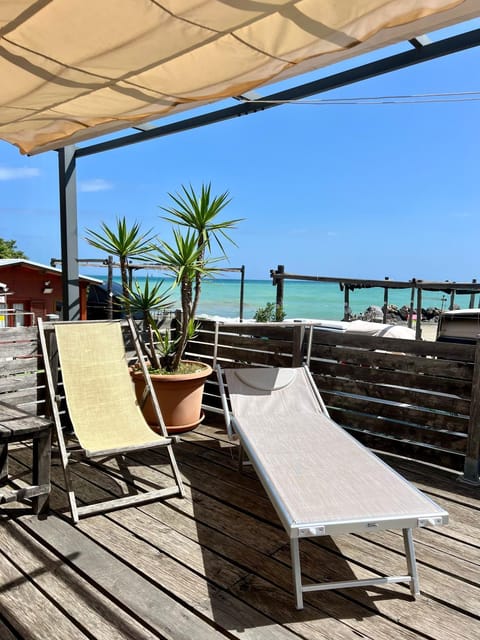 Patio, Solarium, View (from property/room), Balcony/Terrace, Seating area, Beach, Sea view, sunbed