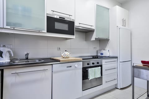 Kitchen or kitchenette, oven, stove, toaster