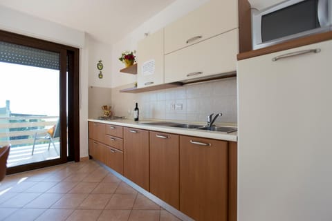 Elena House Condo in Fertilia