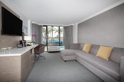 Living room, Seating area, Pool view