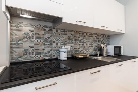 Kitchen or kitchenette, stove, toaster