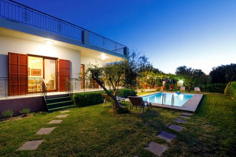 Property building, Garden, Swimming pool, Swimming pool, Sunset