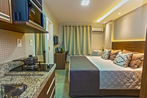 Bed, Coffee/tea facilities, Kitchen or kitchenette, Dining area, Bedroom, minibar, air conditioner