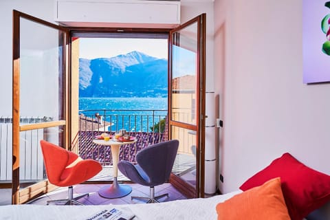 View (from property/room), Balcony/Terrace, Balcony/Terrace, Living room, Seating area, Lake view, Landmark view, Mountain view