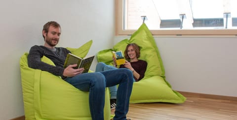 Communal lounge/ TV room, People, Library, Lounge or bar