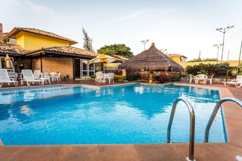 Property building, Day, Pool view, Swimming pool, sunbed