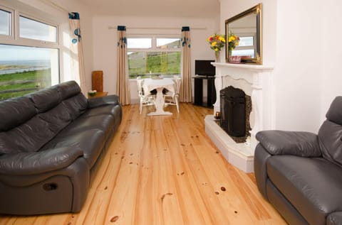 Living room, Seating area, fireplace, flat iron