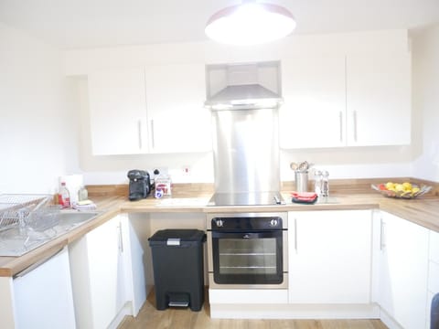 Kitchen or kitchenette, oven, toaster