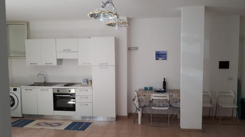 Dining area, oven, stove, washing machine