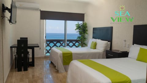 Bed, TV and multimedia, Kitchen or kitchenette, Photo of the whole room, Bedroom, Landmark view, Sea view