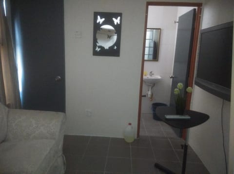 Toilet, Bathroom, Living room, Seating area, Bedroom