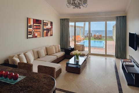 Living room, Seating area, Pool view