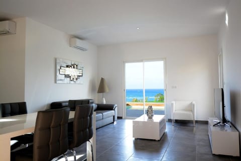 Seating area, Dining area, Pool view, Sea view