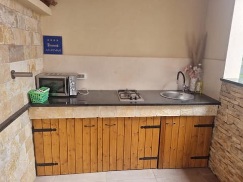 Kitchen or kitchenette, stove