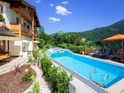 Property building, Garden, Pool view, Swimming pool