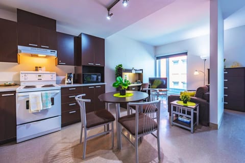 Photo of the whole room, Dining area, oven, stove