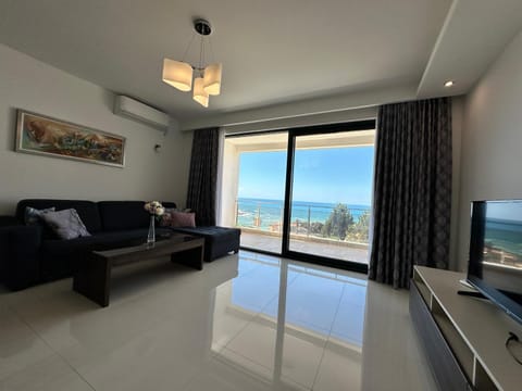 Living room, Seating area, Sea view, air conditioner