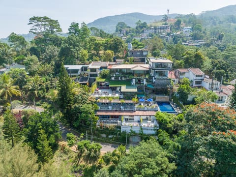 Property building, Spring, Day, Neighbourhood, Natural landscape, Bird's eye view, Mountain view, Street view, Location