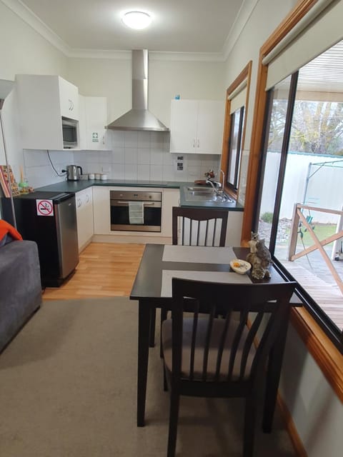 Dining area, minibar, oven, kitchen