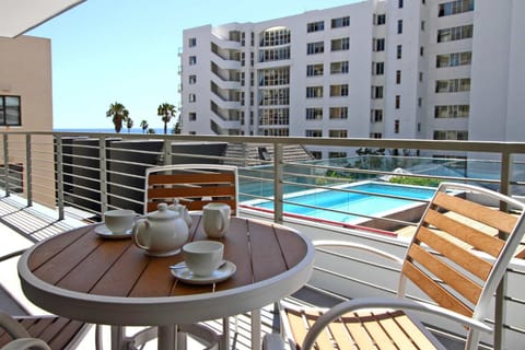 Property building, Balcony/Terrace, Dining area, Pool view, Swimming pool