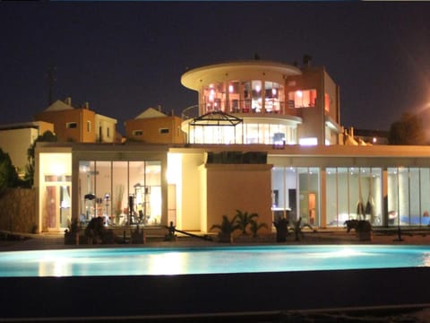 Property building, Night, Pool view, Swimming pool