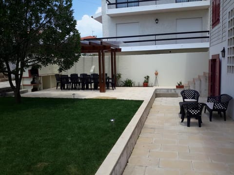 Property building, Patio, BBQ facilities, Garden, Balcony/Terrace