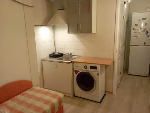 Kitchen or kitchenette, washing machine