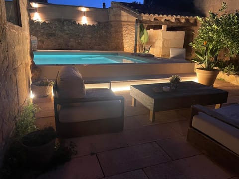 Patio, Night, Pool view, sunbed