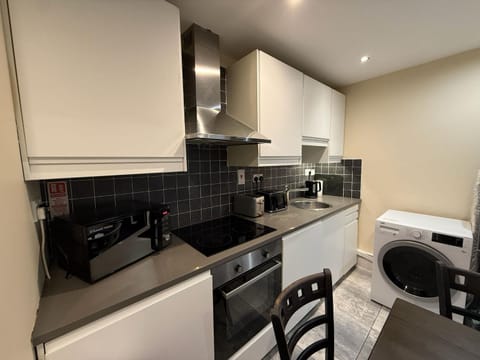 Kitchen or kitchenette, Dining area, dishwasher, oven, stove, toaster