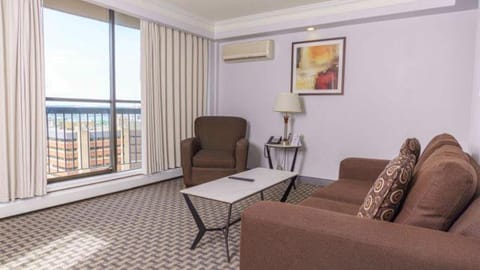 View (from property/room), Balcony/Terrace, Living room, Seating area, air conditioner