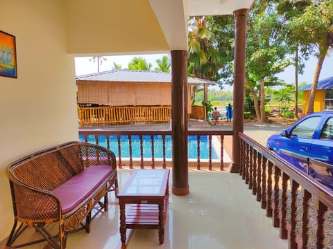 Balcony/Terrace, Seating area, Pool view