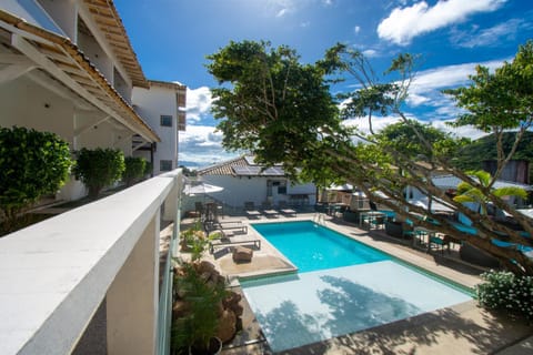 Property building, Day, Pool view, Swimming pool, sunbed