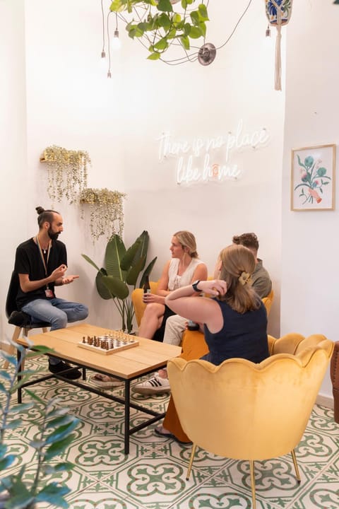 People, Living room, Seating area, group of guests