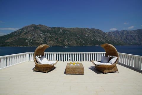 PENTHOUSE STOLIV New SPA-POOL Villa is located 5m from the sea, Exclusive Terrace,Private Jetty wih Sunbeds, Pebble Beach, Secluded location Total area 375m2 at your disposal Condo in Kotor Municipality