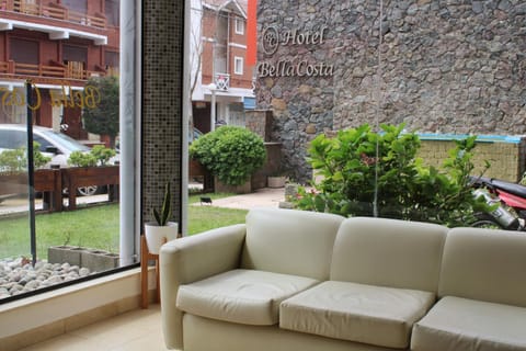 Property building, View (from property/room), Lobby or reception, Seating area, Garden view