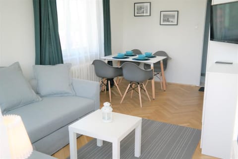 Bed, TV and multimedia, Living room, Seating area, Dining area