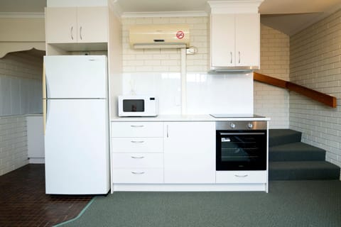 Kitchen or kitchenette, oven, stove