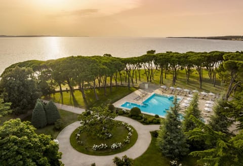 Property building, Spring, Day, Natural landscape, Summer, Garden, Beach, Autumn, On site, Garden view, Sea view, Swimming pool, Seasons, Time of day, Location, Sunrise, Sunset, Inner courtyard view