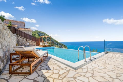 Patio, Nearby landmark, Day, Natural landscape, Pool view, Sea view, Swimming pool, sunbed