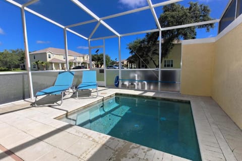 Serenity 3 Bed 3 Bath Townhome with Pool, Private Balcony, Clubhouse, Communal Pool, Conservation View, Disney 15 mins by Orlando Holiday Rental Homes LLC 17401 Maison in Four Corners