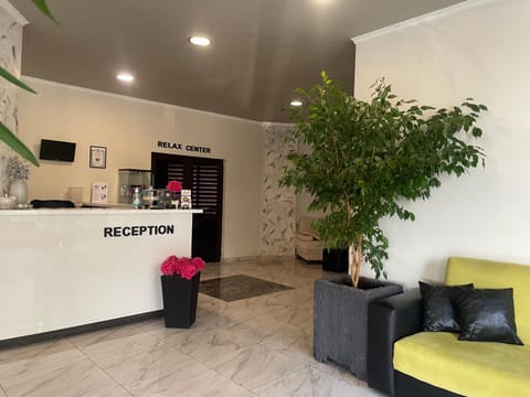 Lobby or reception, Seating area, Text overlay