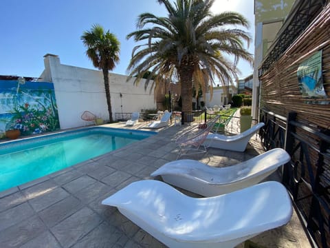 Patio, Day, Natural landscape, Solarium, Pool view, Swimming pool, sunbed