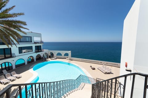 Property building, Natural landscape, View (from property/room), Pool view, Sea view, Swimming pool, sunbed