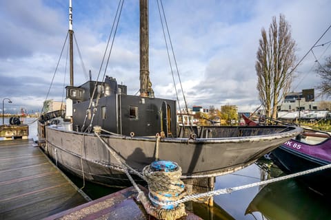 Asile Flottant Docked boat in Amsterdam