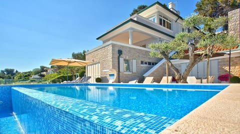 Facade/entrance, Sea view, Swimming pool