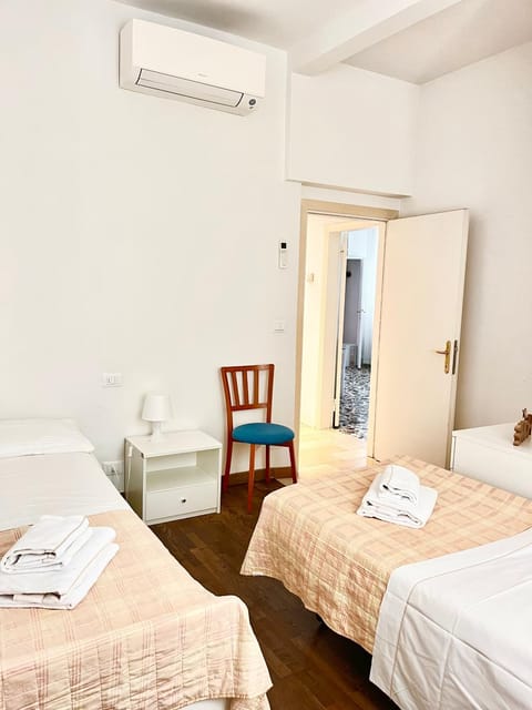 Bedroom, towels, wardrobe, air conditioner